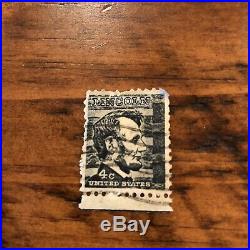 Abraham Lincoln 4 cent black stamp used